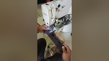 Automatic flip flop bartack machine for label attaching