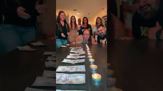 Family is challenged to see who can blow out the most tea light candles with one breath!