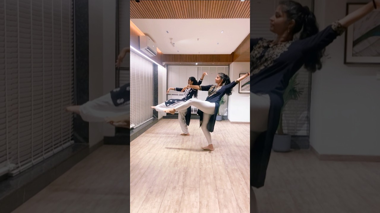 One leg, two dancers, and a whole lot of balance..