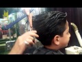 Cutting the hair of a young child - حلاقة طفل صغير