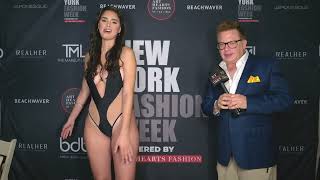 Model Isabella Zayas wears Megan Mae Miami swimsuit backstage at Art Hearts Fashion / NYFW