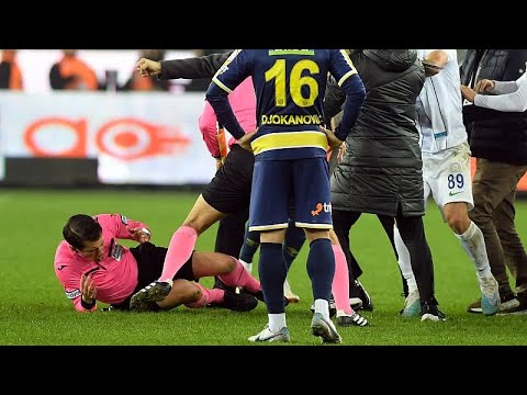 Three men arrested and Turkish league games suspended after referee