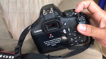 An error prevented shooting. turn the camera off and on again or re-install the battery