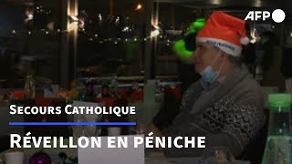 Réveillon sur Seine pour des bénéficiaires du Secours Catholique | AFP
