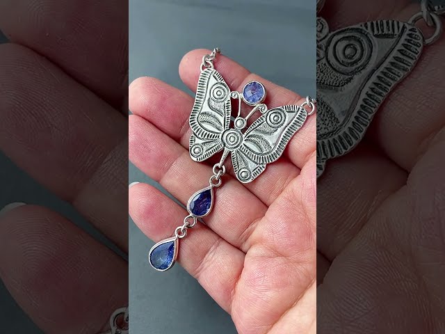 * Sparkling Butterfly Pendant with Tanzanite Gems. class=