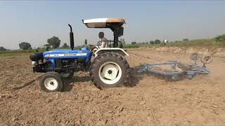 New Holland 3630 Special Edition tractor mileage test with harrow in Seenk