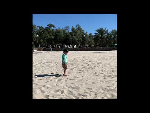 Lucas beaching in Al Mamzar Beach, Dubai
