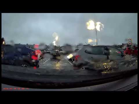 Slowest car crash hilariously caught on camera as two Scots reverse into each other in car park