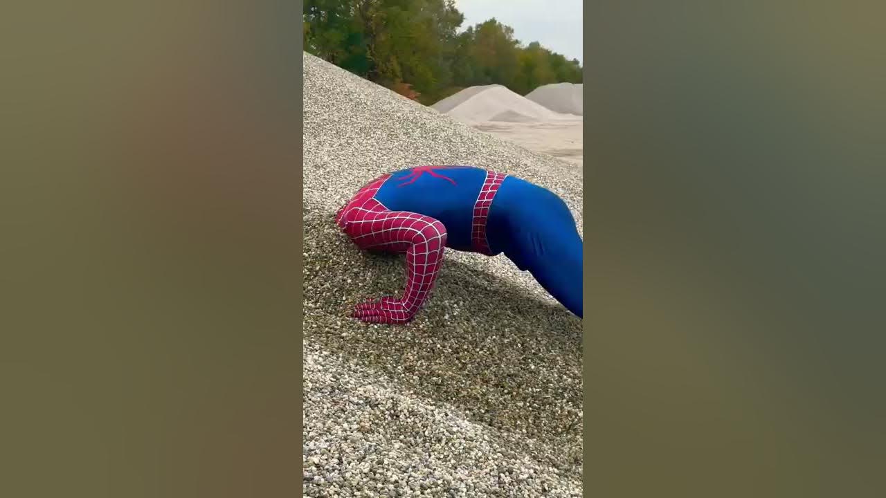 Spiderman’s Head Stuck In Sand Spiderman’s Head Stuck In Sand