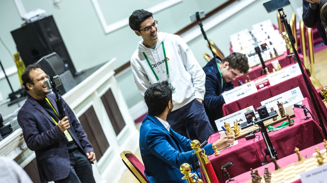 Anish Giri reacts to cutest Anish Giri interview! ft. Vidit, Samay,  Adhiban  At the Tata Steel Chess India 2019 Vedika Gujrathi (Vidit  Gujrathi's sister) decided to do her first ever interview.