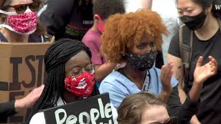 Seattle health care workers march to protest racism as a public health risk