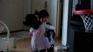 Eleanor hugs Noah 4/8/2009