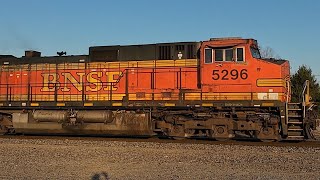 Solo BNSF Dash 9 w/ H2 Paint Scheme Leads an Empty Intermodal Car Train