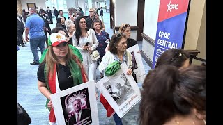 Group of Iranian Americans chants "Thank you, Trump" at CPAC in support of Iran war