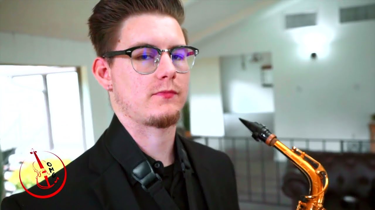 Kole performing Photograph by Ed Sheeran on live saxophone