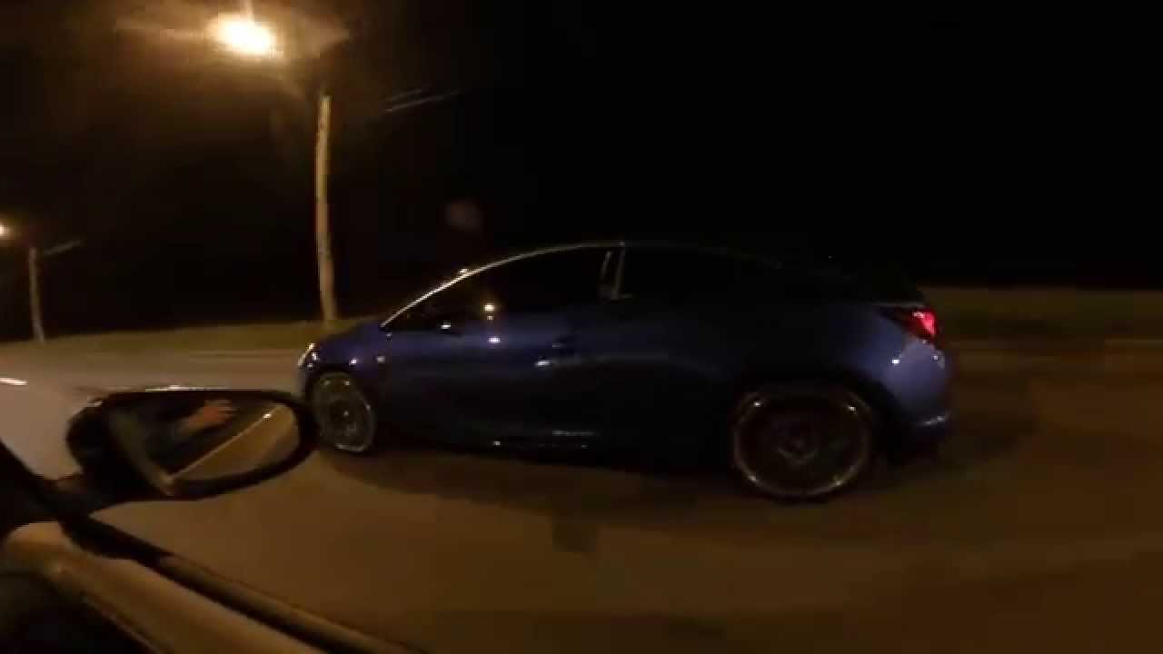 Golf 6 GTI REVO St.2 MT vs Opel Astra OPC Stock (custom exhaust)