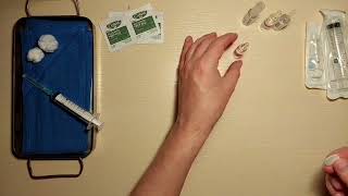Розкриття шприца та набирання ліків з ампули (taking medicine from an ampoule