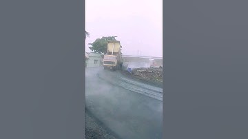 service road bc laying akhri load me pani avya#bc laying #dbm #youtubeshorts #constructionequipment