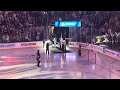 Fans sing national anthem at St. Louis Blues game