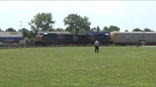 A Slow and Long CSX Autorack Train Meets a Fast Moving Stack Train at the Iron Triangle