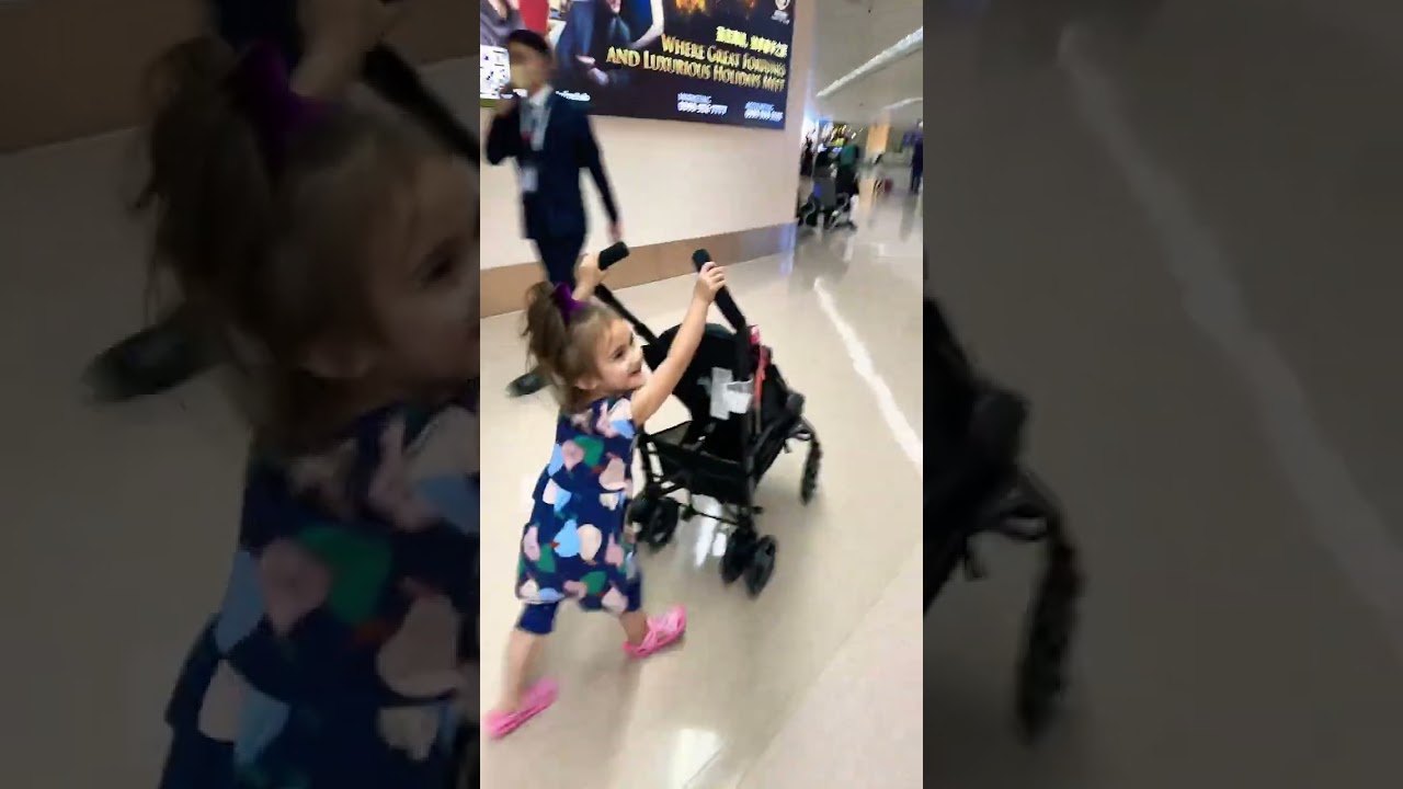 CUTE 4 YEAR OLD GIRL PLAYING AT JAPAN INTERNATIONAL AIRPORT 