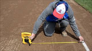 Preparing A Baseball Field For Play