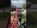 Many hands (and a conveyor) make light work!🔺#woodyard #machinery #firewood #delivery
