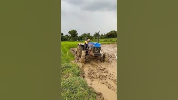 Powertrac 4wd tractor working in mud #shorts #trending #tractor