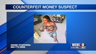 Law enforcement looking for woman using counterfeit money