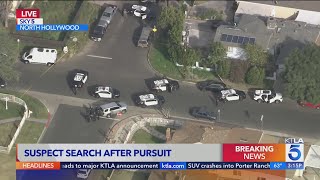 LAPD officers search for murder suspect following chase