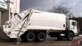 new garbage truck safety features