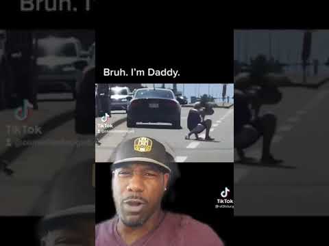 MAN TRIES TO GET DUCKS OUT OF THE STREET