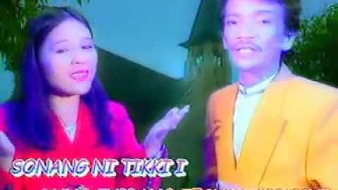 Charles Simbolon & Juli Manurung - Marolop olop Tondikki ( Official Music Video )