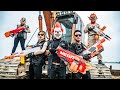 LTT Films Nerf War : Group S.W.A.T Go To The Park Fight Hunt Down Criminals Rocket Wear Masks