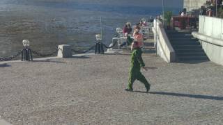 A lonely dancer on the Moscow river bank