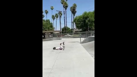 Person does a face plant after a failed ollie over the pyramid.