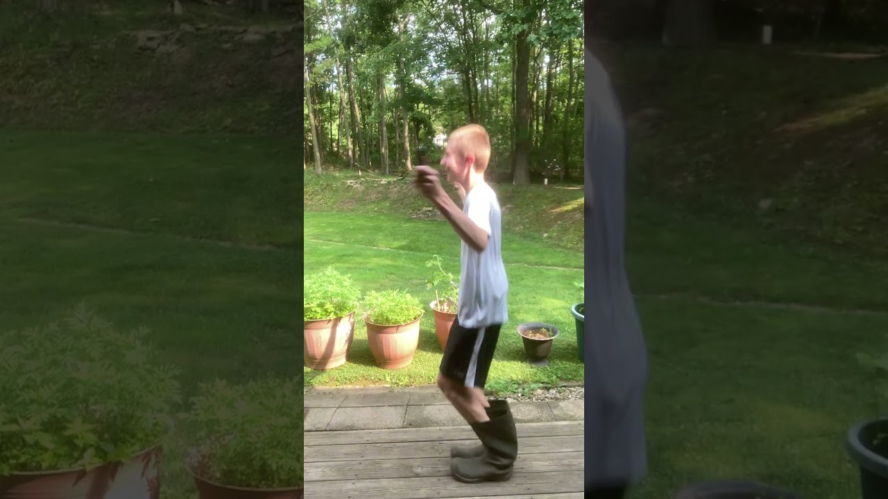 Family challenge - Contestant 01 (Jumping rope in muck boots).