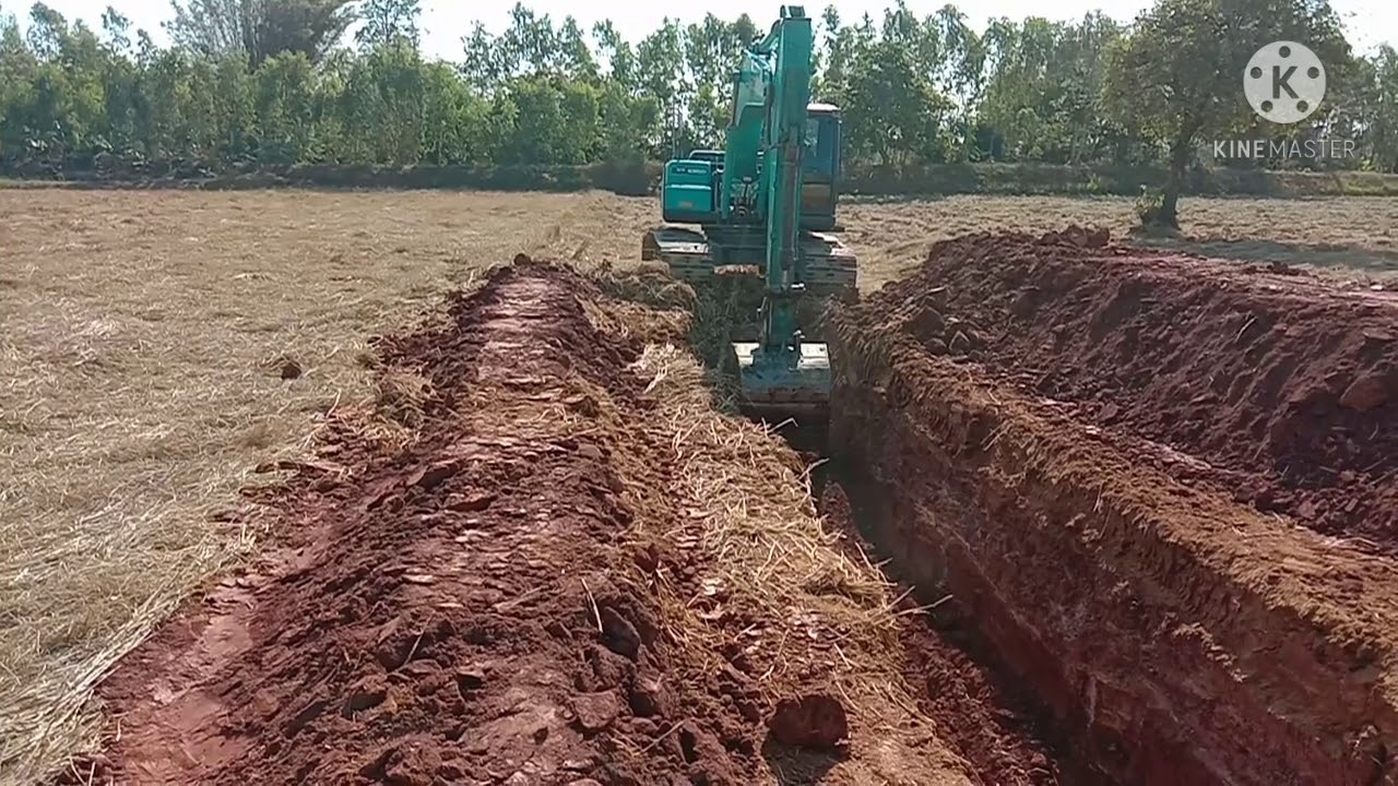 มาดูโครงการดีๆจากกรมพัฒนาที่ดินครับผม รถแม็คโคร sx200 ขุดคลองไส้ไก่หรือขุดร่องน้ำในทุ่งนา