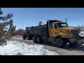 Workers clear mounds of snow in downtown Casper