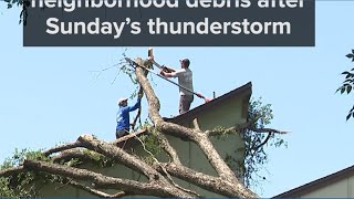 Austinites clean up neighborhood debris after Sunday's thunderstorm