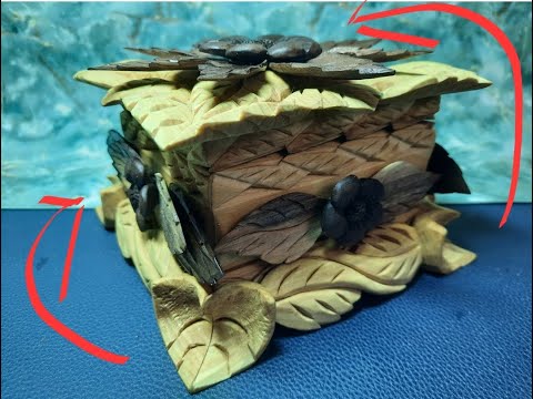 Украшение шкатулки объёмными листьями и ромашками