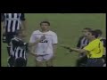 football player gives a yellow card the referee