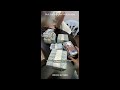 Seorang individu menjual duit lama dalam bentuk bata.!