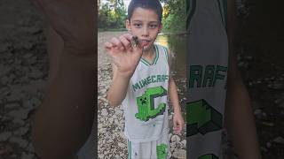 Elis first time catching a fish/crawfish by hand