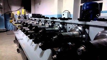 Roll forming machine with in-line punching.