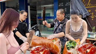The neighborhood roasts the most beautiful and delicious pigs in the northern market.