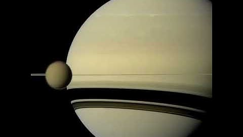 Timelapse of Europa & Io orbiting Jupiter, captured by the Cassini space probe.