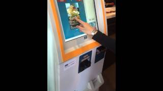 Use self service order and payment kiosk in Eat'z 19 Restaurant