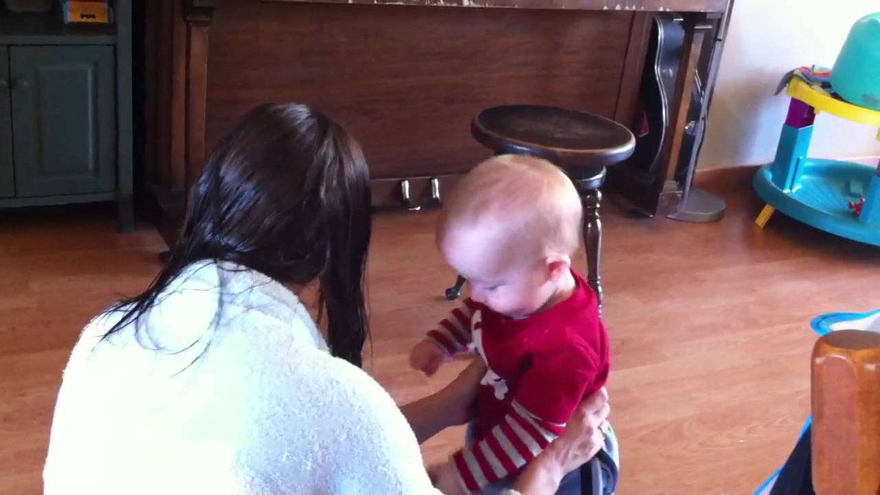 Baby brushes Mom's hair YouTube