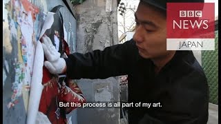 廃墟の壁に人、人、人　若手芸術家が中国の今を表現